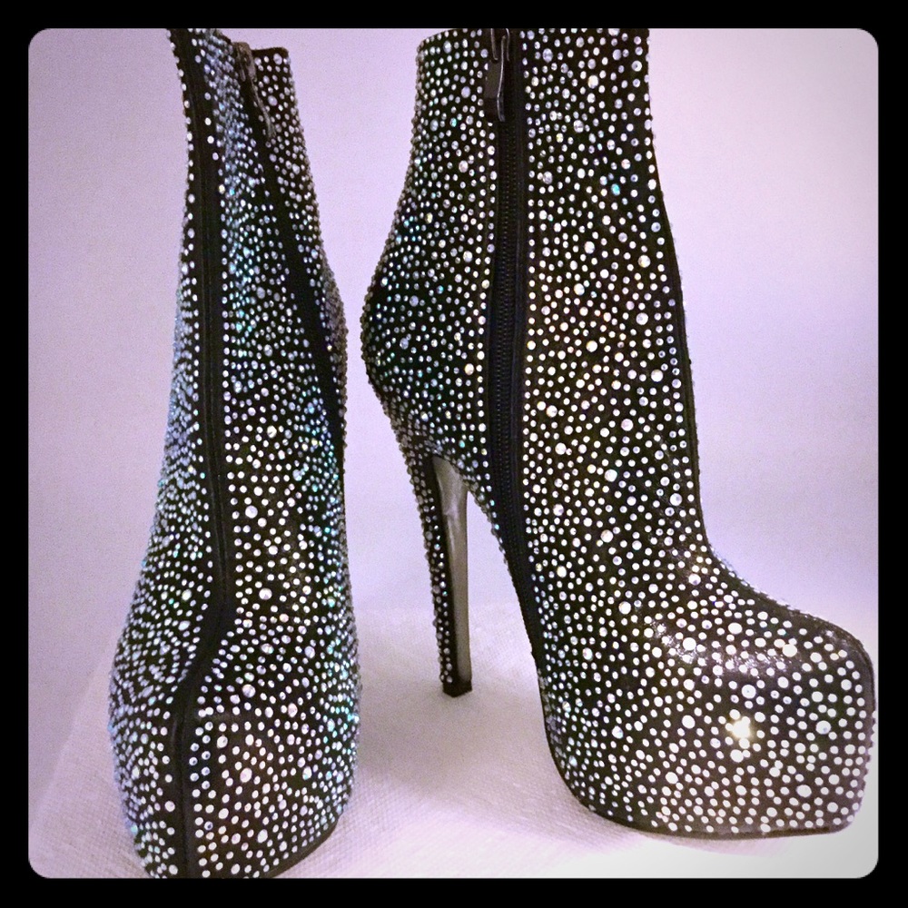 Black rhinestone covered high platform bootie.